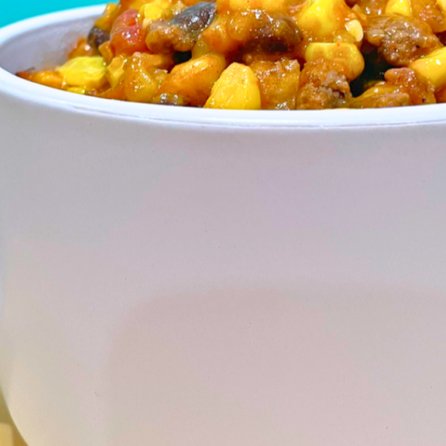 Tater tot casserole in a white cup
